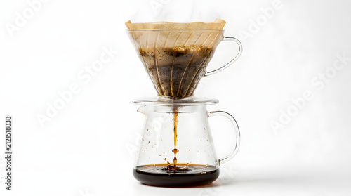 Studio shot of an unbranded clear glass cone coffee dripper resting directly on top of the opening of a clear glass carafe, isolated on a seamless pure white background.