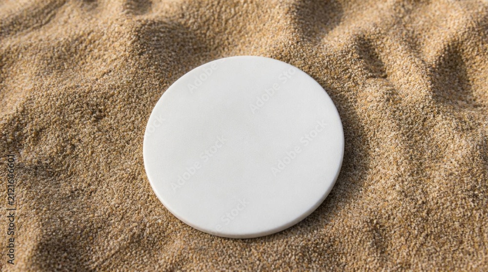 Obraz premium Blank white round podium resting on natural beach sand top view