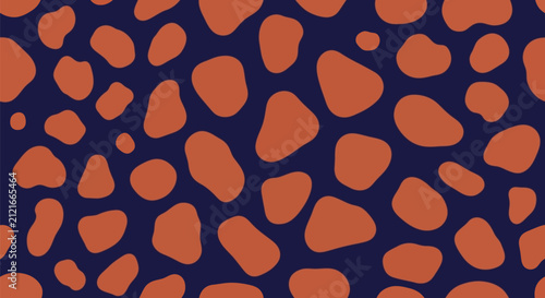 Abstract giraffe skin pattern in orange and dark blue colors animal print texture for fashion design and decorative background.
