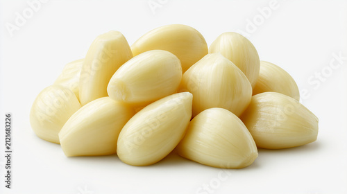 A pile of peeled fresh garlic cloves isolated on white background