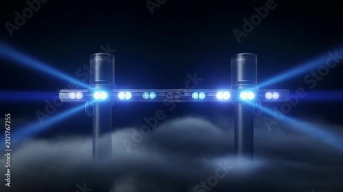Cross structure with cinematic blue and red lights emerging from fog during night