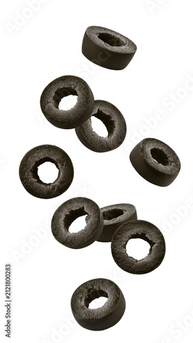 Falling black Olive slice, isolated, full depth of field