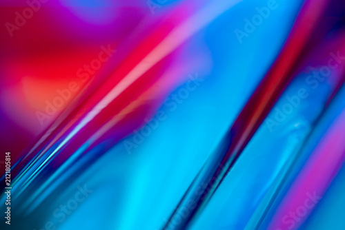Abstract blue and magenta light streak background