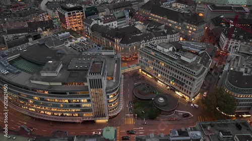evening time illumination zurich city central area modern office exterior traffic street square aerial panorama 4k switzerland       