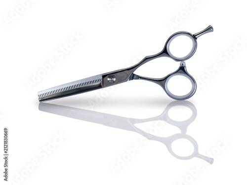 Thinning scissors with reflection isolated on white background