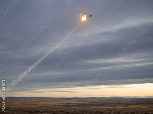 Air Defense Missile Intercepting Drone in Cloudy Sky