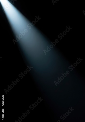 Bright Spotlight Beam on Dark Background.