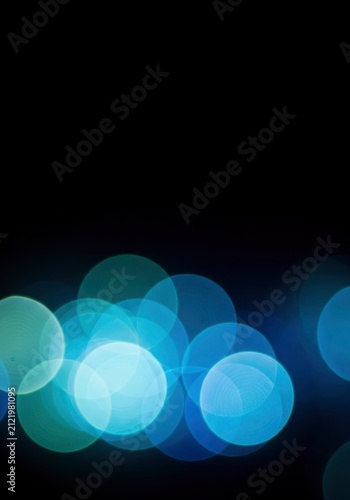 Abstract Blue Bokeh Lights on Dark Background.