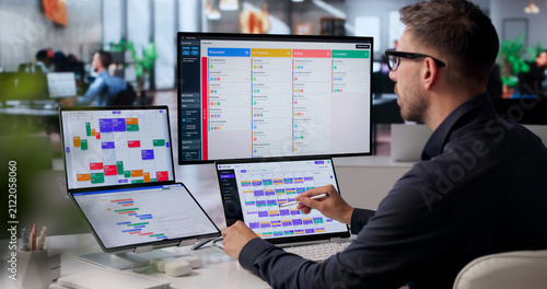 Project Manager Reviews Agile Tasks