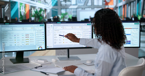 Bild auf Leinwand Young African American Lawyer Uses Digital Dashboard