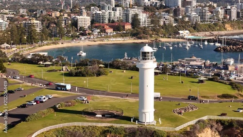 Aerial drone view of Wollongong on the NSW South Coast, Australia showing the Flagstaff Point Lighthouse in the foreground on a sunny day in August 2026  