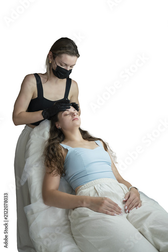 woman lies in an armchair, receiving a massage after a cosmetic injection, relaxing after a rejuvenation procedure, isolated object on transparent background, png