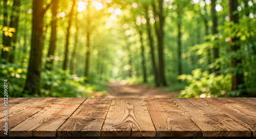 Empty Rustic Wooden Tabletop with Sunlit Green Forest Background and Bokeh
