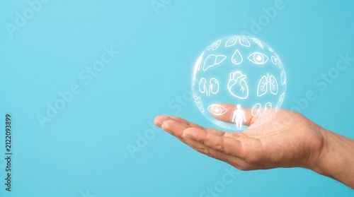 close up young man hand gesture and show about organ donation of human cell on blue background for kindness of. living and medical nonprofit concept
