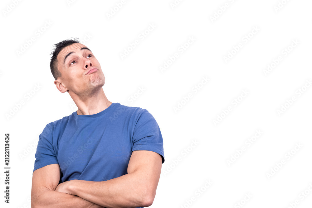 Fototapeta premium Man with arms folded looking up with a satisfied expression