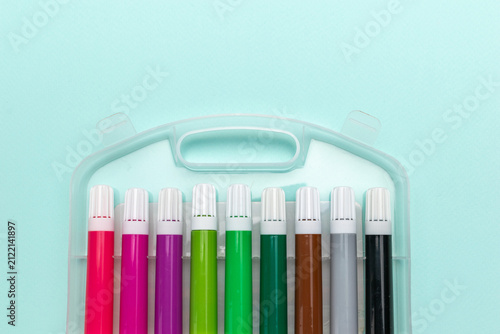 Obraz na płótnie Colorful Marker Set on Pastel Background: Creativity and Art Supplies Display
