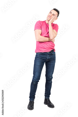 Fotografie Dreamy man touching cheek in studio, transparent background