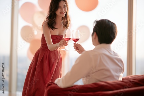 Romantic couple celebrating with champagne at elegant party