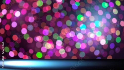 Abstract colorful bokeh lights background with a glowing blue surface