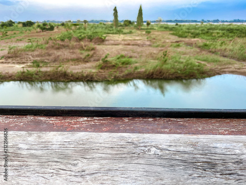 Empty Grunge Wooden Shelf On Landscape Country View Background At Nakhon Phanom, Thailand. 07 Nov 2024. P.M.