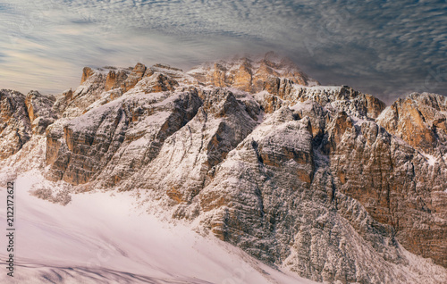 The mountain landscape changes face with the arrival of the long-awaited first snowfall on the Tofane in Cortina d'Ampezzo.