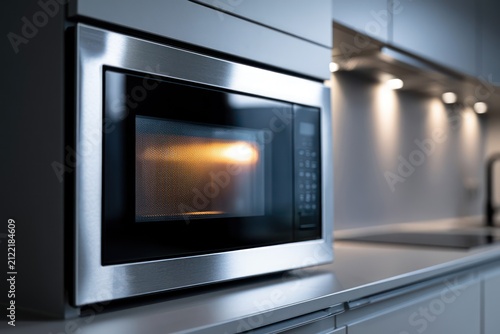 Built-in microwave oven in luxury kitchen design