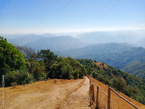 Photography Landscape of The path descending from the summit is steep with a wooden handrail
