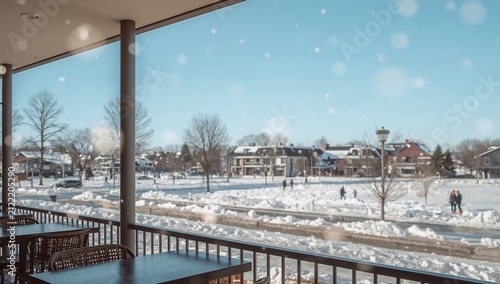 Cozy cafe overlook offers warm respite from winter snowfall