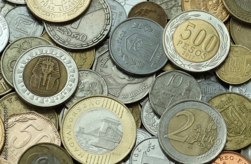 Konstfotografi Big bunch of coins from various money currencies
