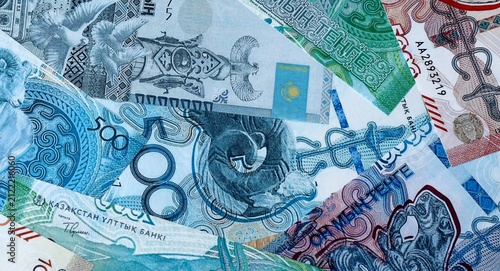 фотографія Kazakhstani tenge money bills in pile on table