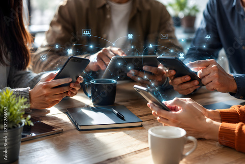 People Using Mobile Devices in Collaborative Workspace