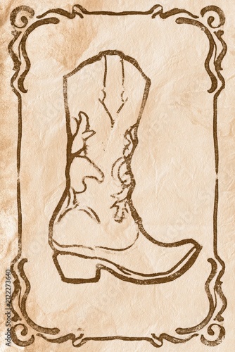 Vintage cowboy boot symbol with decorative border stamped on textured paper