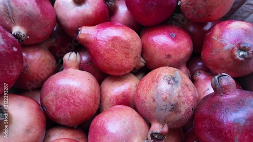 Ripe Pomegranate Fruit Falling on Pomegranate box