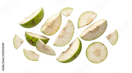 Slices of fresh green breadfruit scattered on a white background, showing the pale interior and textured skin of the tropical fruit.