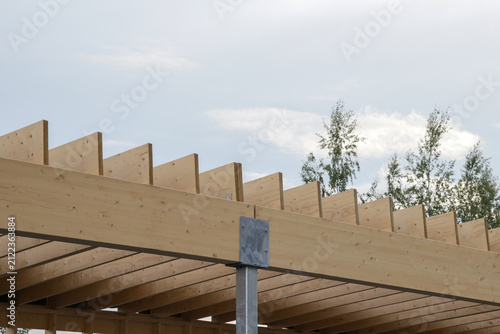 Quadro su tela Mass Timber Roof Structure Under Construction with Exposed Wooden Beams