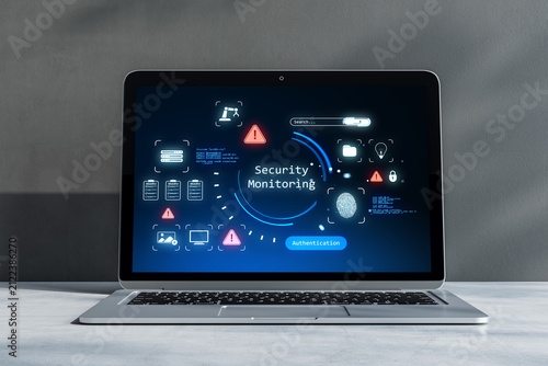 Secure laptop screen with cybersecurity monitoring interface, authentication ...