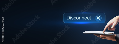 Fotografía Disconnect button on tablet with pointing hand, dark blue digital background and generous copy space for technology, privacy, and communication concepts