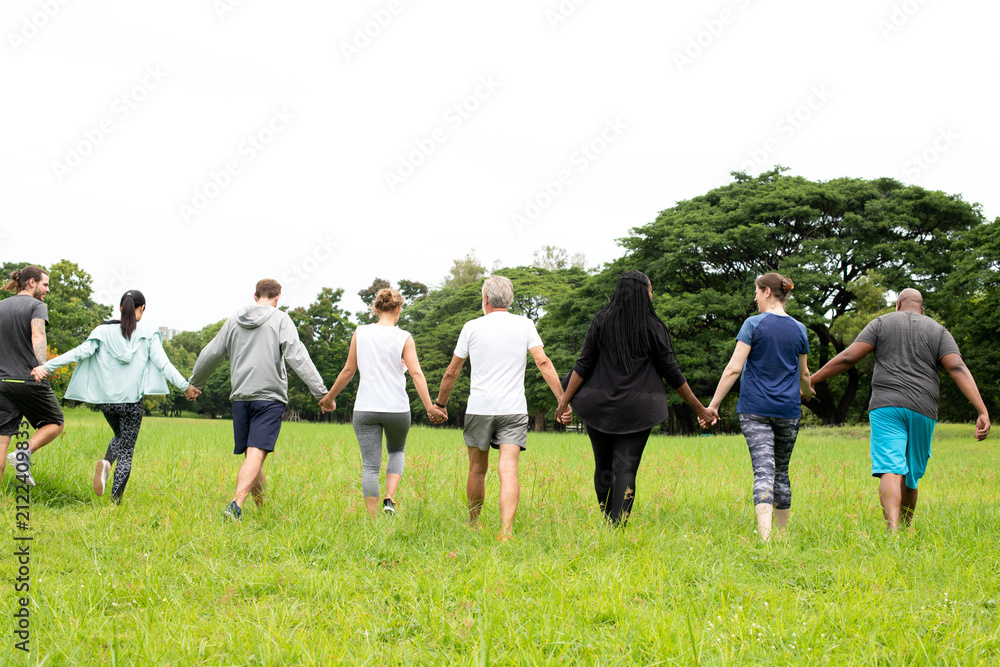 Obraz premium Diverse group walking together outdoors