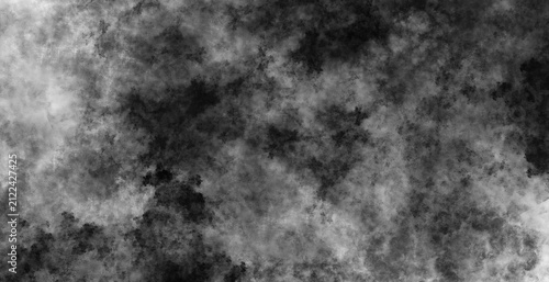 Contemporary monochrome grunge wash backdrop with intricate dark smoke spots and flowing subtle fog patterns creating a dynamic abstract atmosphere
