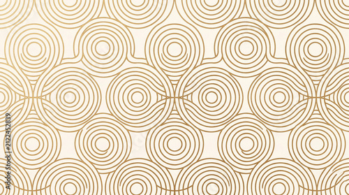 Abstract gold concentric circle pattern on a light background, creating a harmonious and elegant design