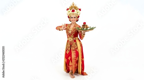 Balinese Woman in Traditional Red and Gold Ceremonial Dance Costume Holding Offering Tray on White Background