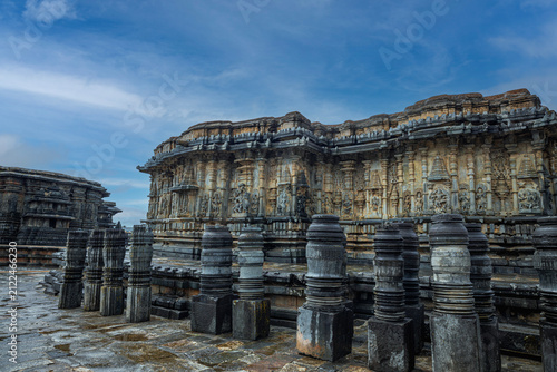 Konstfotografi Intricately carved exterior of the Chennakeshava Temple in Belur, Karnataka, India, under a dramatic blue sky