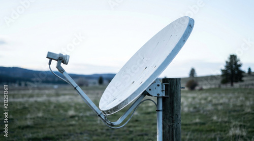 Satellite dish rural close up communication antenna internet parabolic dish field sky wireless signal technology equipment receiver transmitter