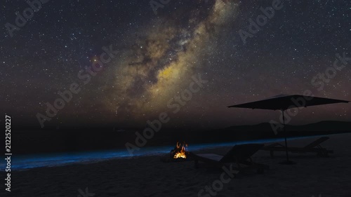 Milky Way Over Tropical Beach with Bioluminescent Water