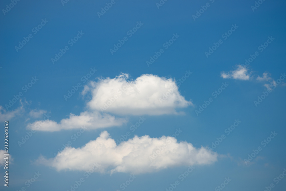 Fototapeta premium beautiful blue sky and white fluffy cloud horizon outdoor for background.