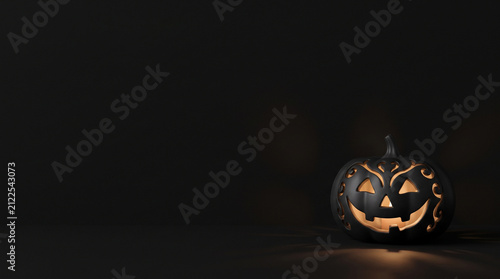 Glowing Jack-o'-lantern on black background. Spooky carved pumpkin for Halloween celebration.