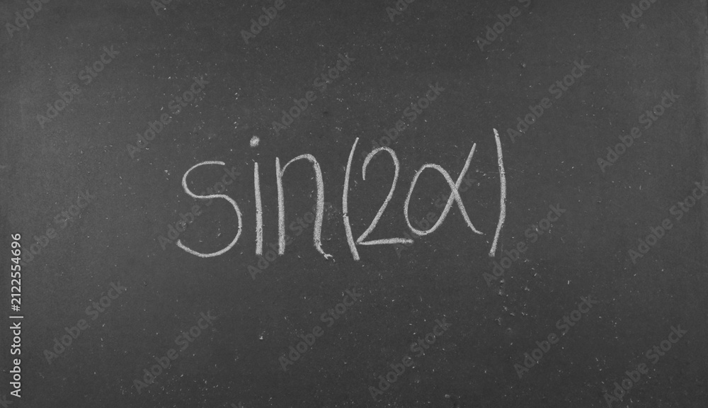 Fototapeta premium The formula for the sine of a double angle on a black school board