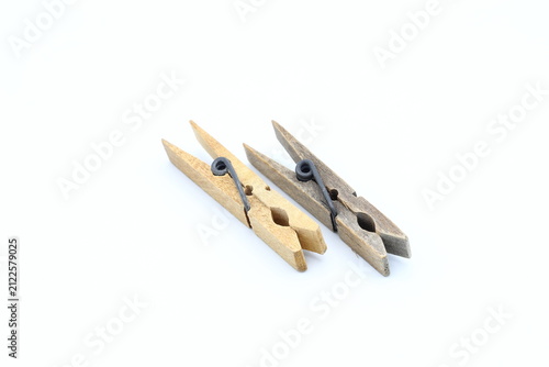 Clothespin wooden. New and old, different age. White background.