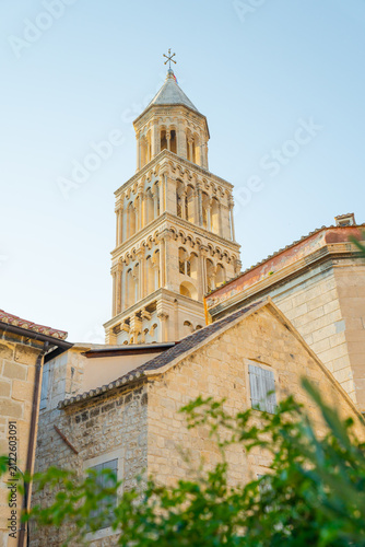 Photography Low angle of Saint Domnius Bell Tower above stone houses in Split, Croatia