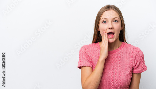 Young Russian woman isolated on white background with surprise and shocked facial expression